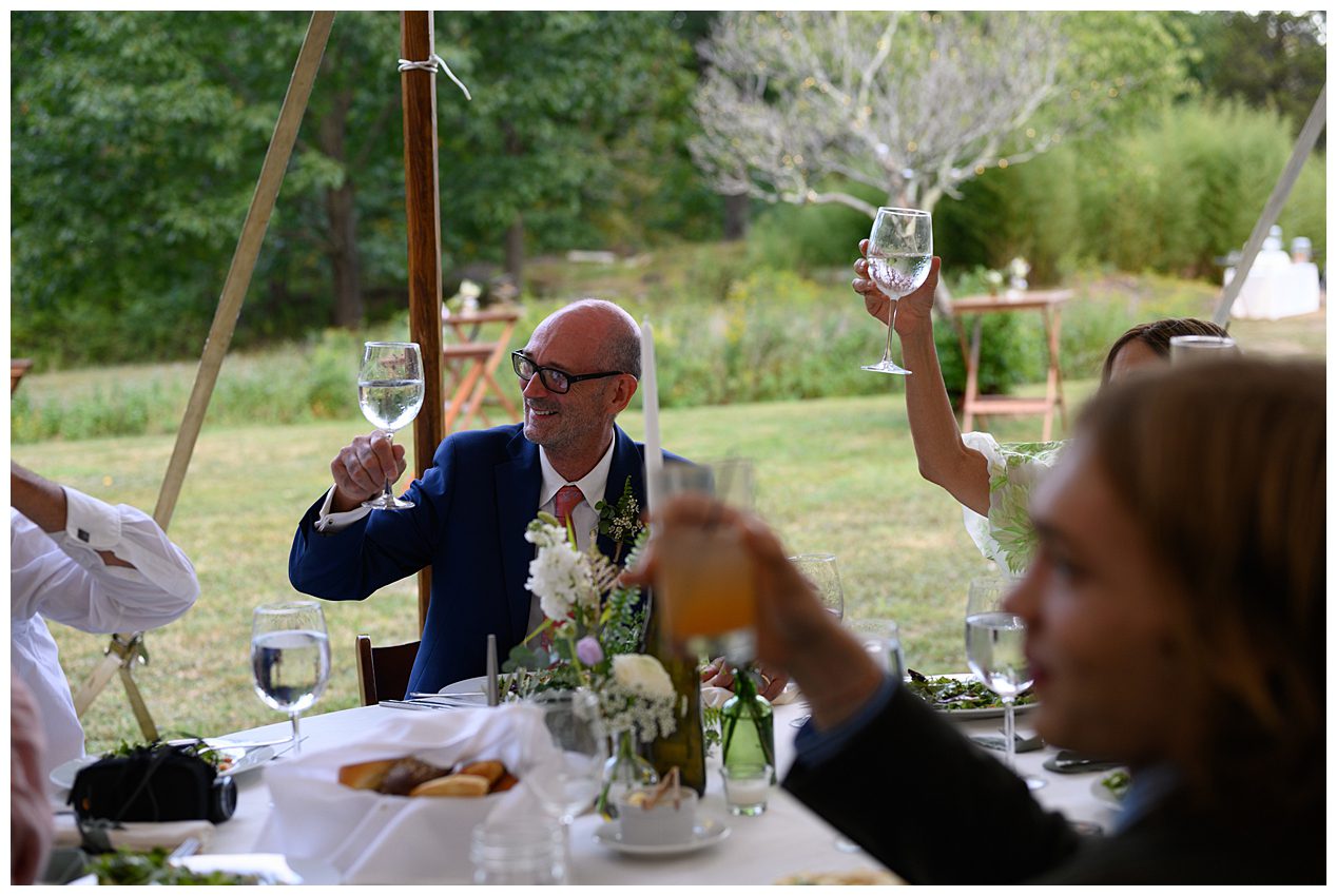 toasts at Backyard wedding in Sherman CT